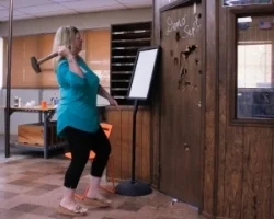 Beth taking a swing