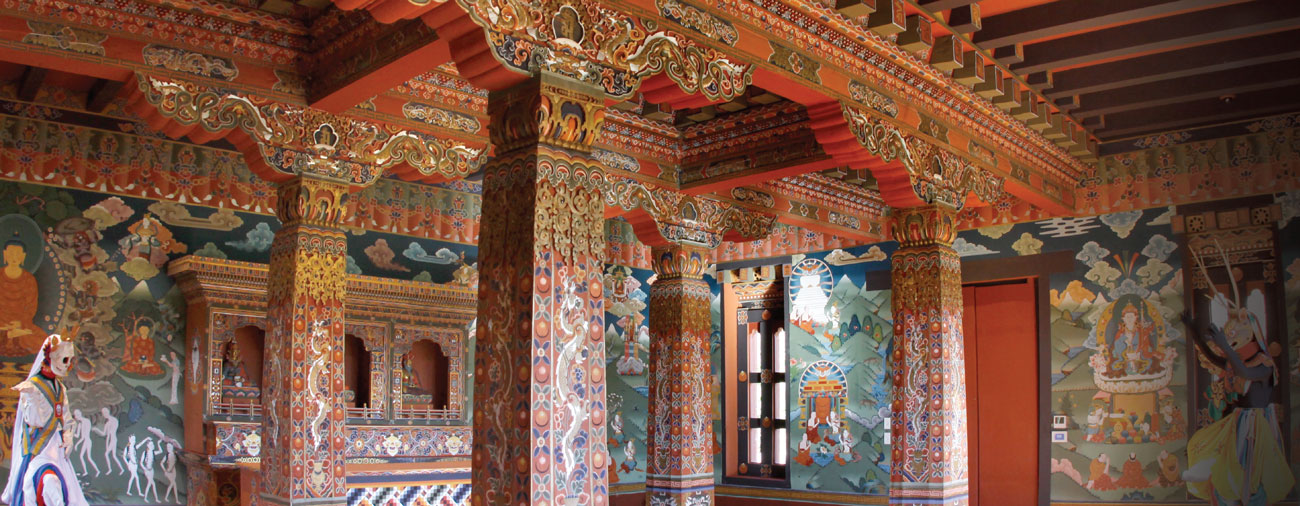 The interior walls of the Lhakhang are covered with floor-to-ceiling, brightly colored paintings that contain examples of Bhutanese iconography very rarely seen outside of the remote Himalayan kingdom and that invite study and reflection to discover their significance.