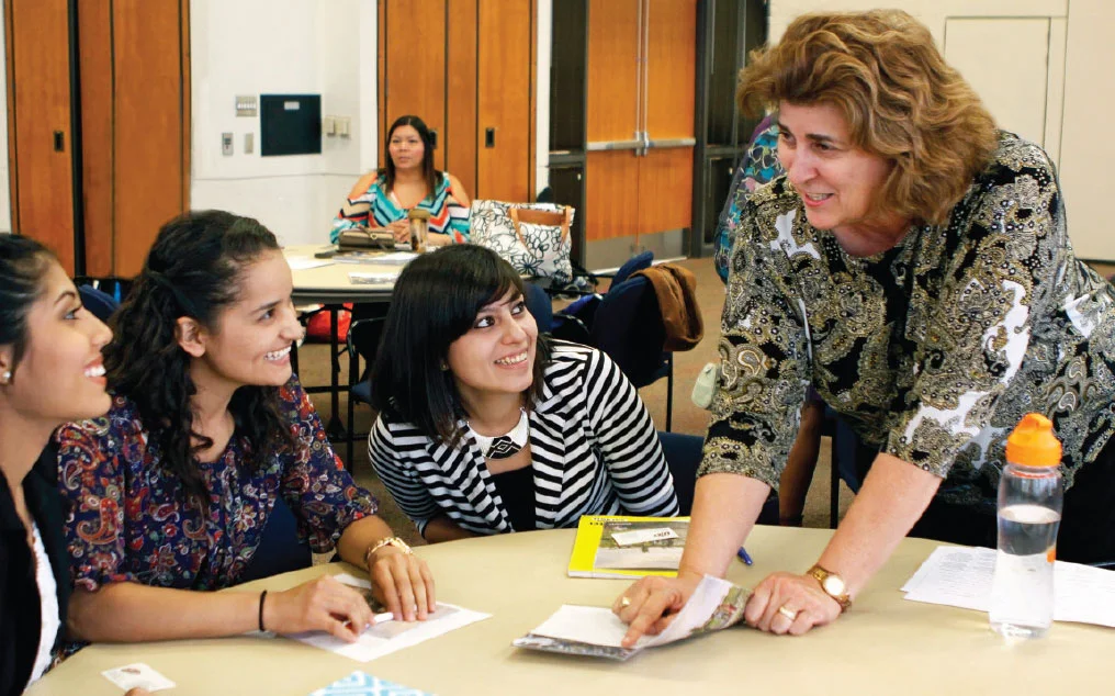 Donna Ekal, Ph.D., right, works with UTEP students. Photo by Laura Trejo