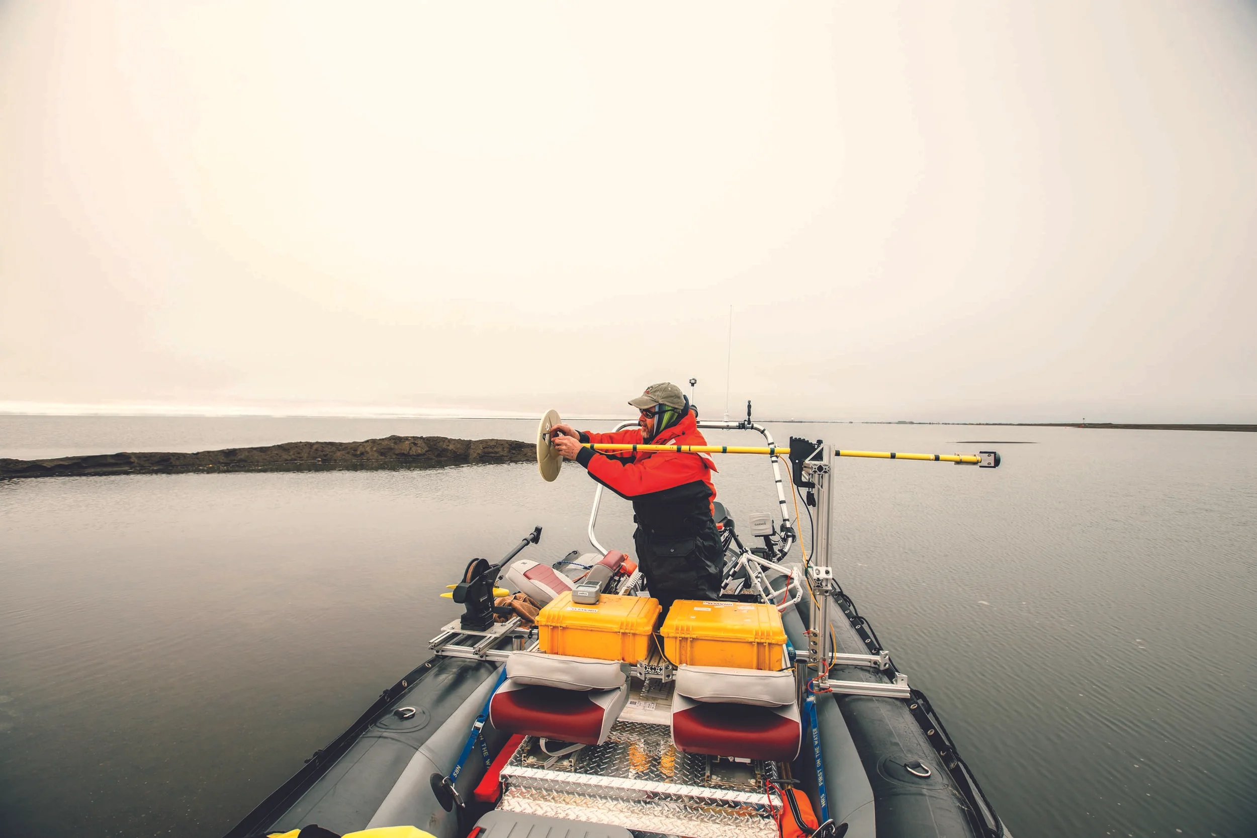 Associate Professor of Biological Sciences Craig Tweedie, Ph.D., readies the scientific instrumentation on his inflatable vessel in preparation for near-shore water chemistry and ocean bottom characterization. Photo by Florencia Mazza Ramsay / forenciamazza.com
