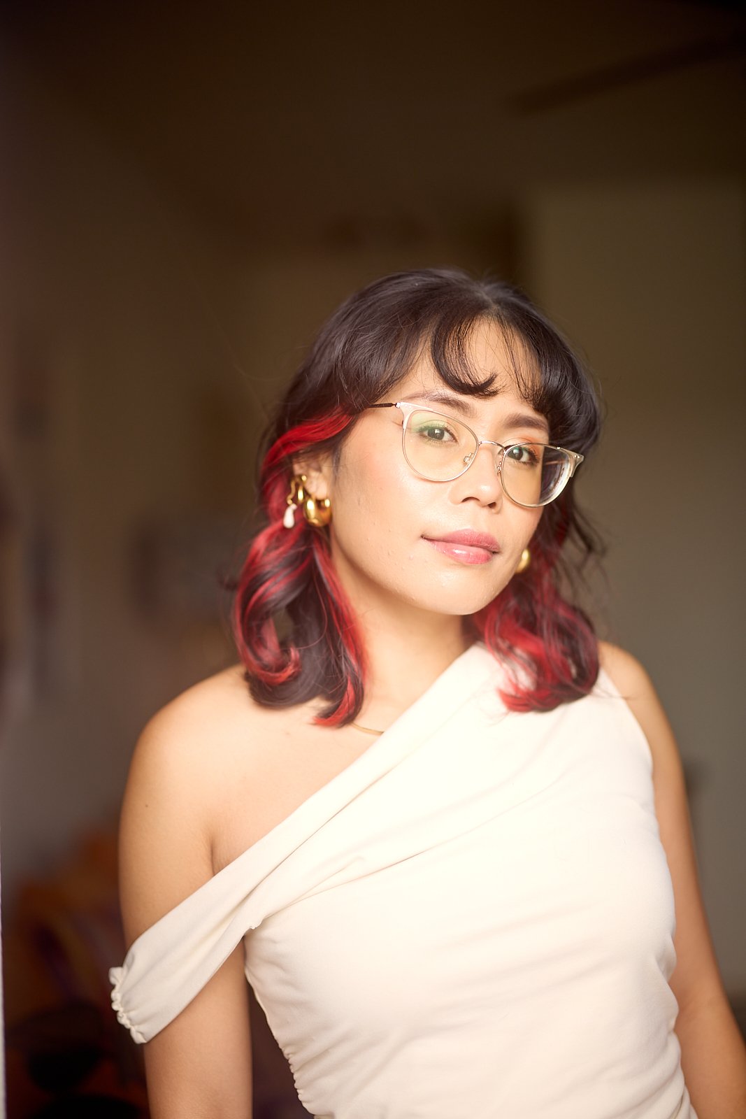 headshot of Regine Malibiran