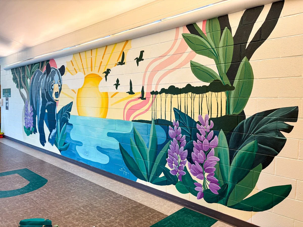 Butler Elementary mural of a florida black bear and coastal dune lake created by Santa Rosa Beach muralist Sarah Page Art