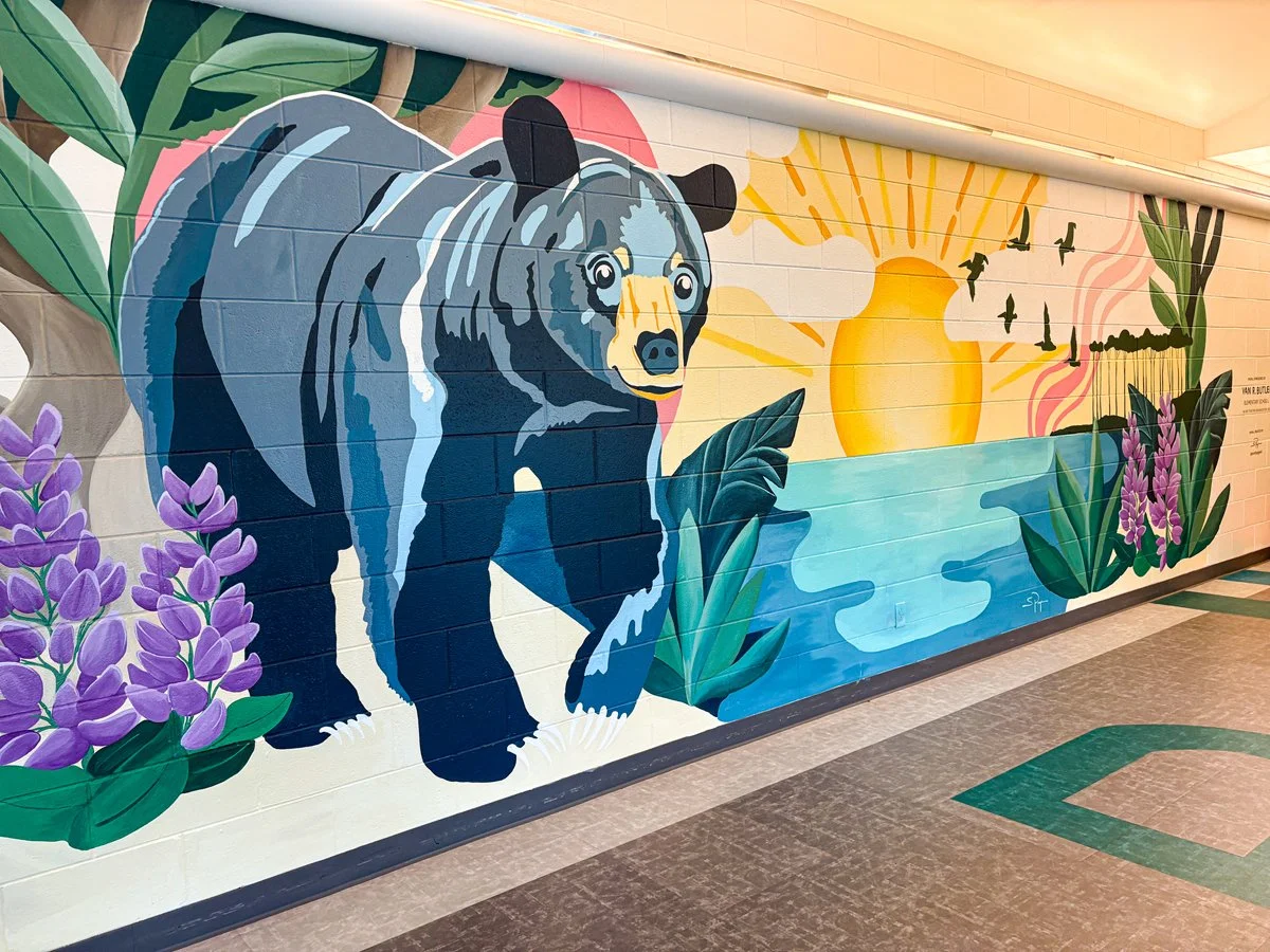 Butler Elementary mural of a florida black bear and coastal dune lake created by Santa Rosa Beach muralist Sarah Page Art
