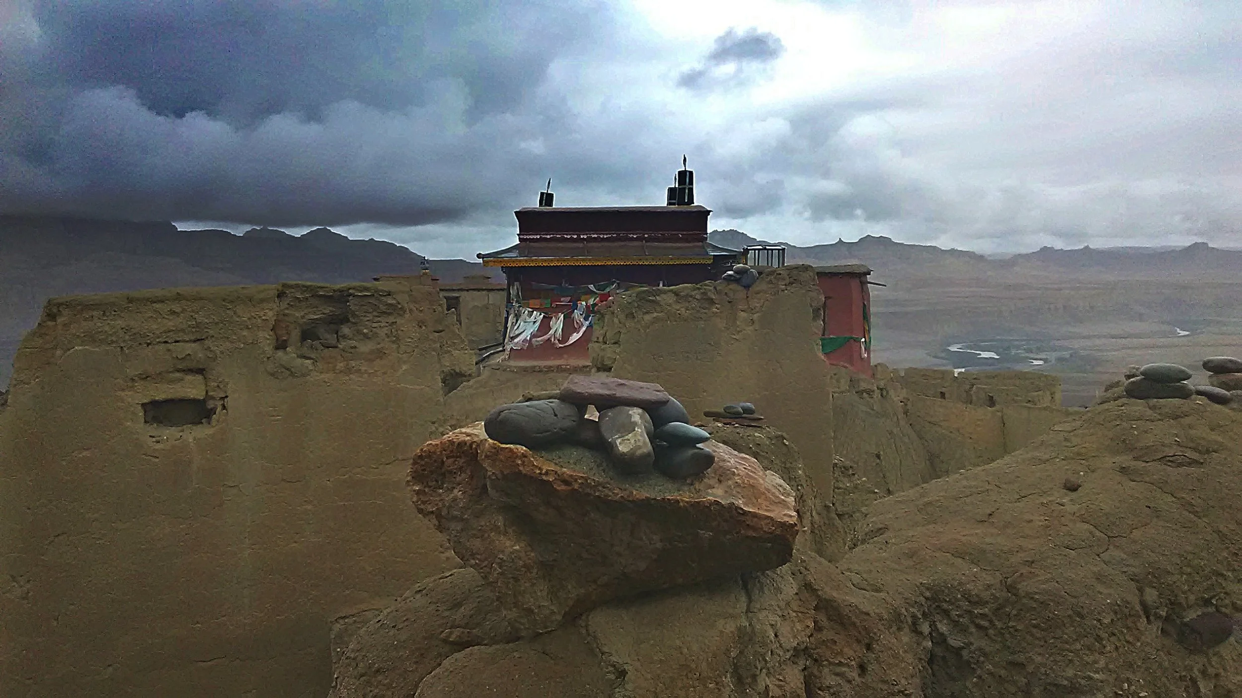 Reconstructed monastery on the top of hill amongst the ancient ruins. Photo Dechen Steele