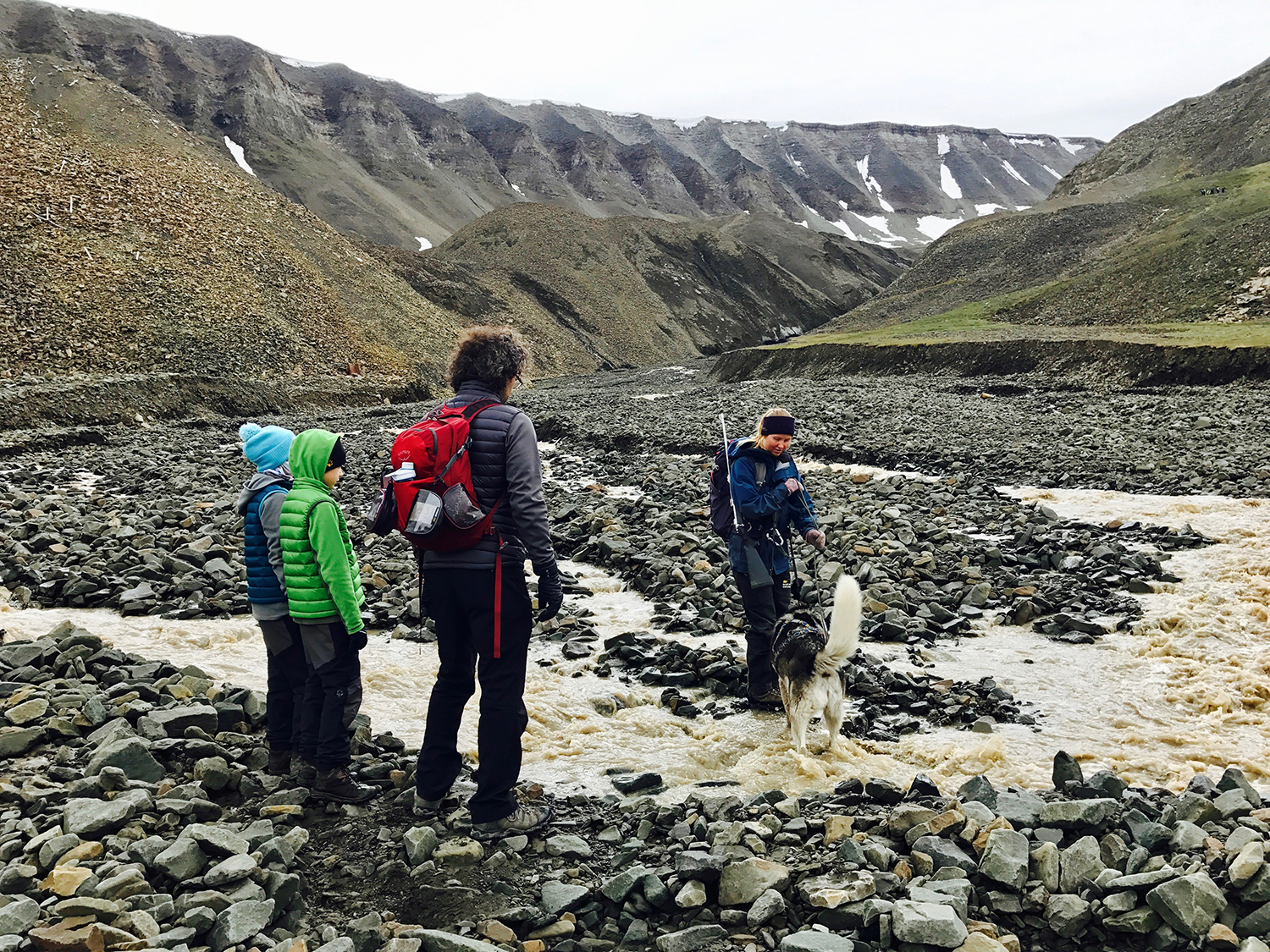 Crossing the river on the way up to Longyearbreen Glacier