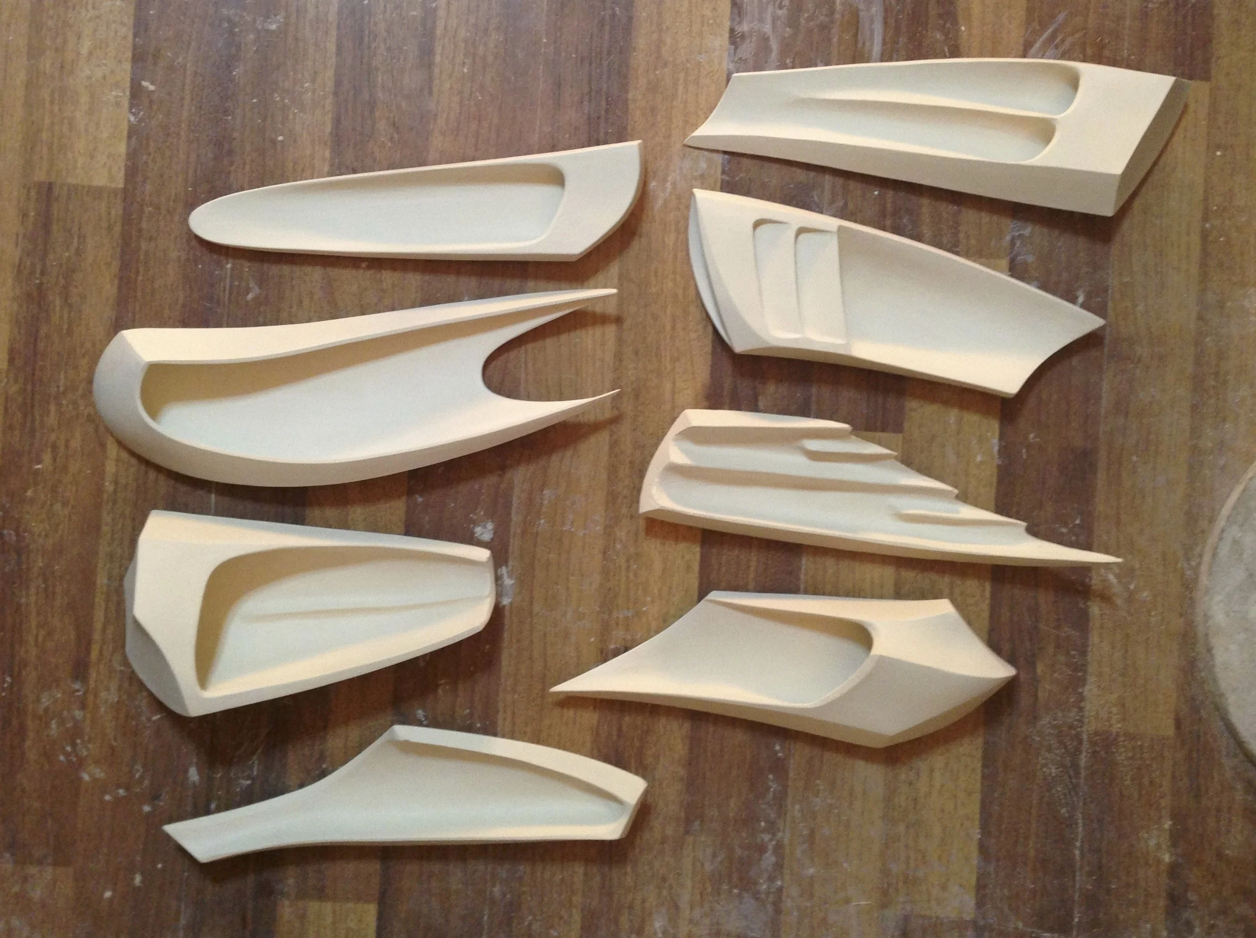 abstracted automotive forms in porcelain.jpg
