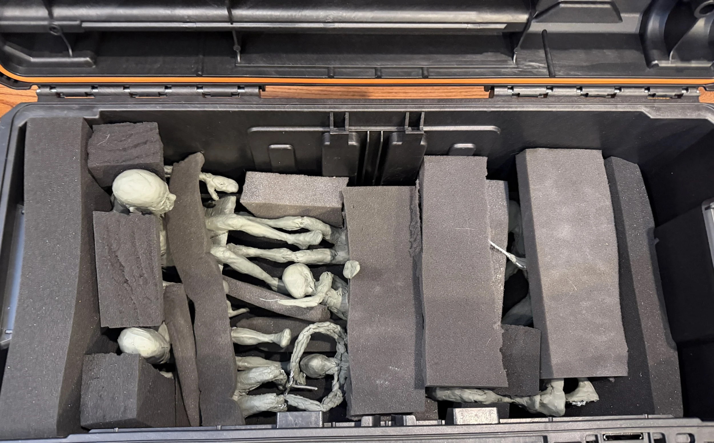 Clay figures packed in a tool box