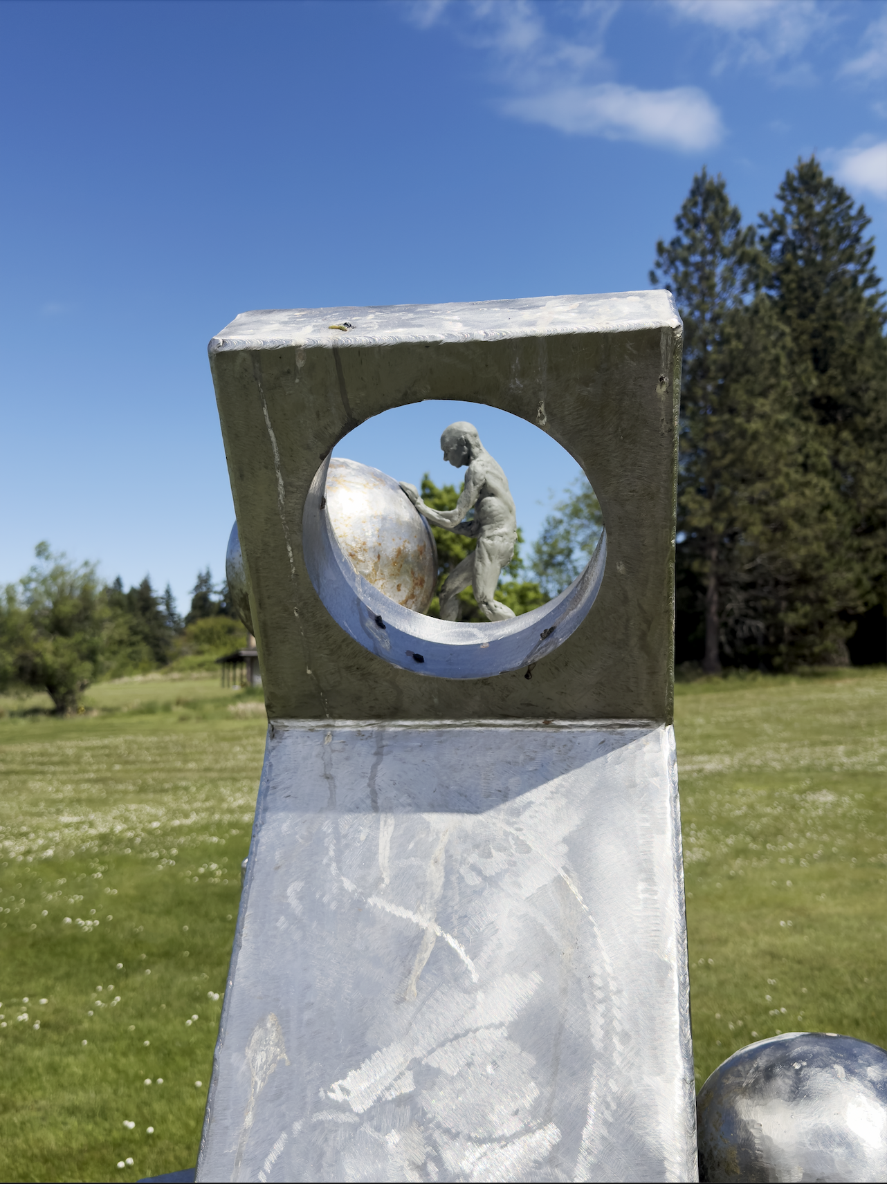 Clay figure in landscape