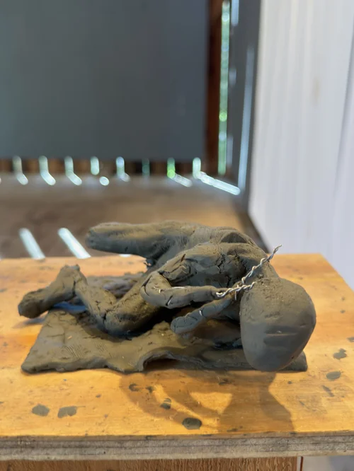 Damaged clay figure after arrival