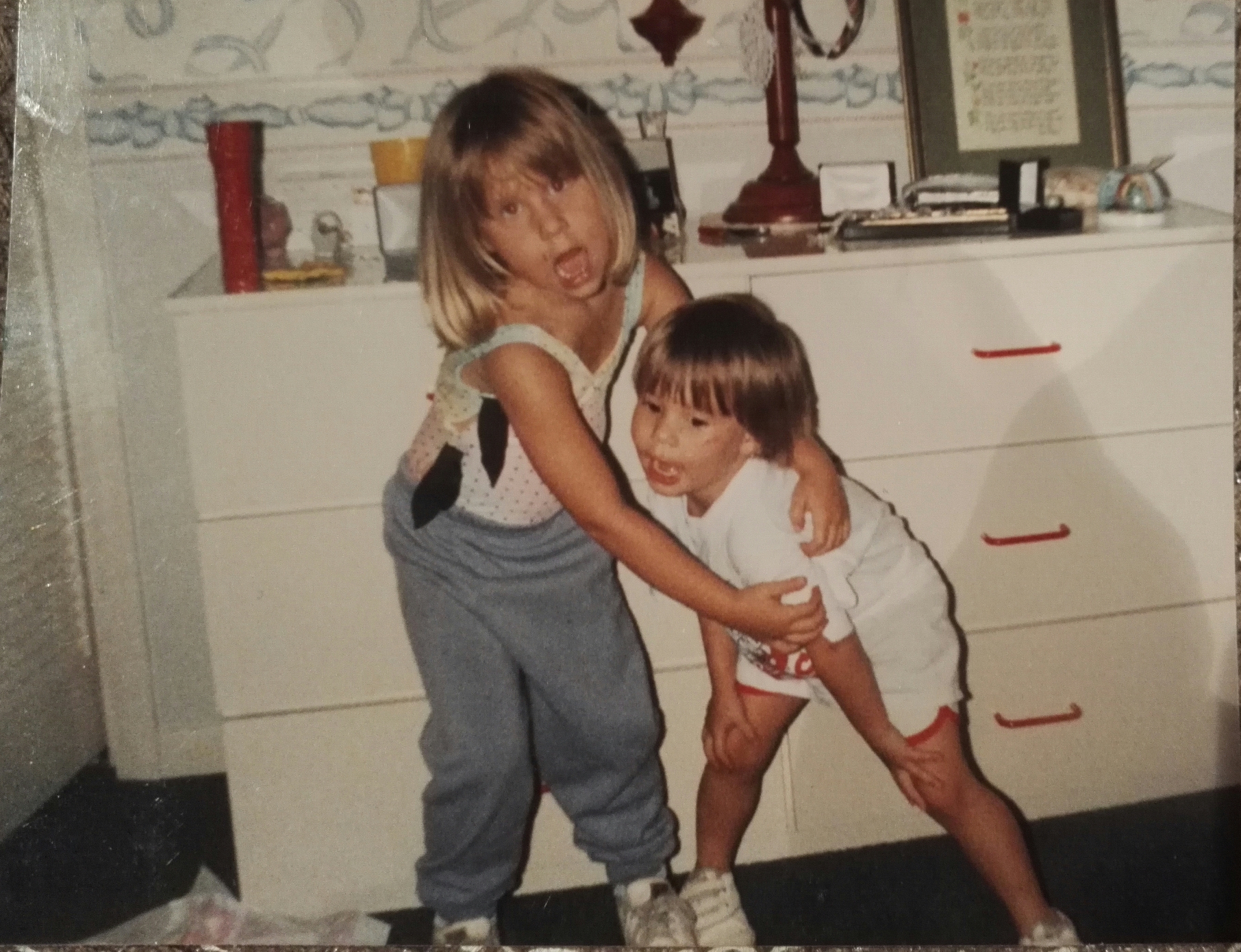 Me on the left, Ally on the right. I'm not sure how old we are in this picture. But I swear we're 17 months apart even though Ally is half my size. 