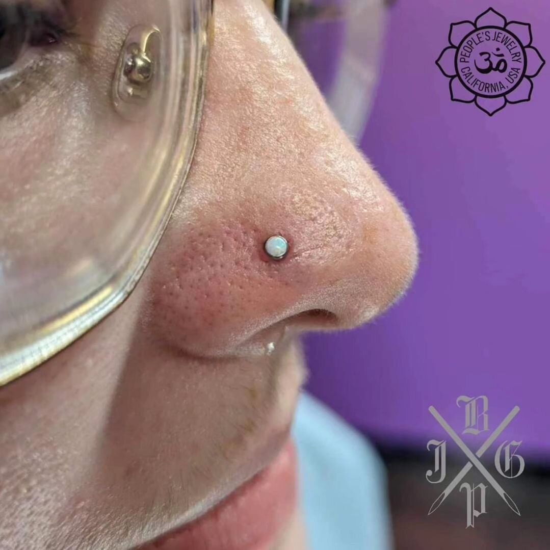 Paired Nostrils by Jack @piercings.jpg done with these beautiful threadless opal tops from @peoples_jewelry 

We take walk ins for piercings so stop on by! @cincinnatitattoo 4951 Glenway Ave, Cincinnati

#cincinnatipiercer #nostrilpiercing
#implantgr