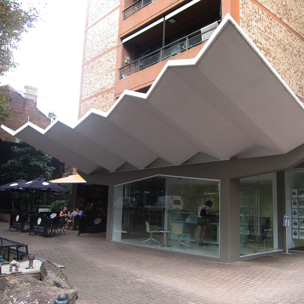   Small businesses, in the base of apartment towers, need to find unique ways to make themselves visible. In this example from Sydney a bold canopy marks the store front.&nbsp;   Sydney, Australia 