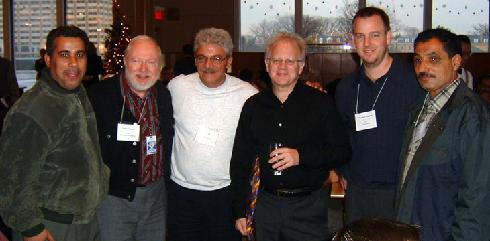 Maestro Leonard Slatkin pauses for a picture with both NSO and INSO musicians.