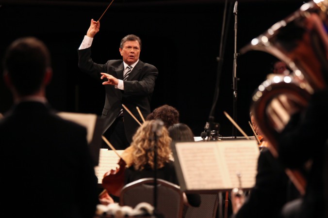Gerard Schwarz conducting the All-Star Orchestra during the filming of their PBS TV special at the Manhattan Center. (Steve Sherman)