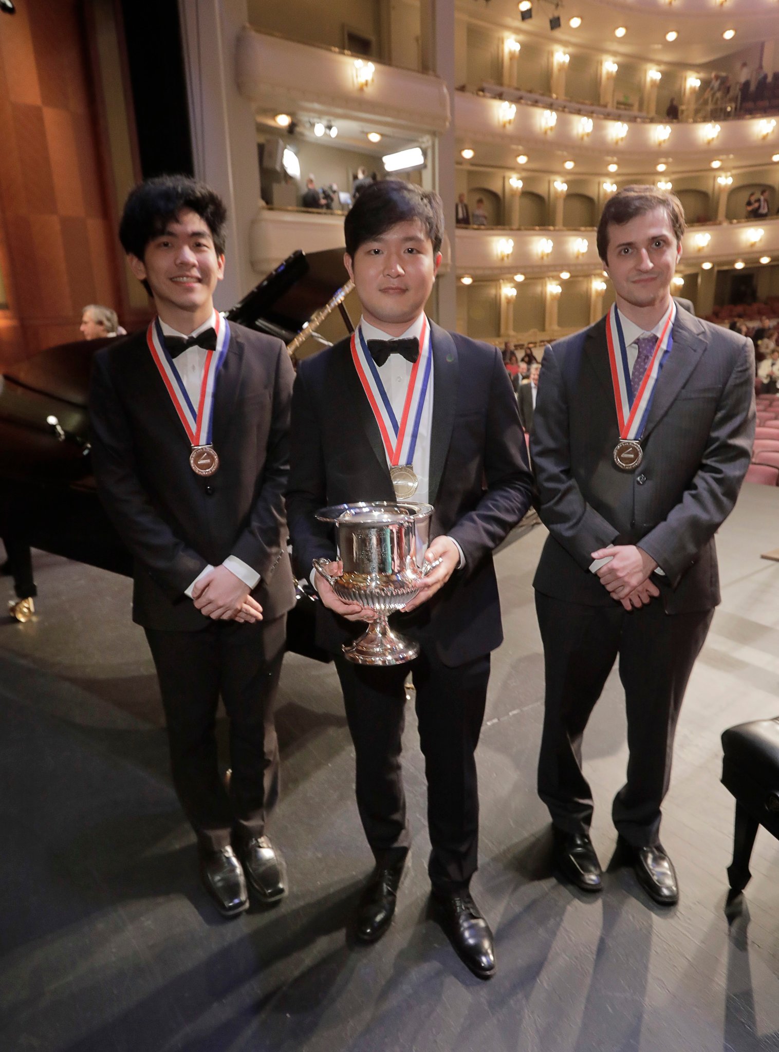 The Cliburn winner, Yekwon Sunwoo, center, with the bronze medalist Daniel Hsu, left, of San Francisco, and the silver medalist Kenneth Broberg, right, of Minneapolis. Credit Ralph Lauer