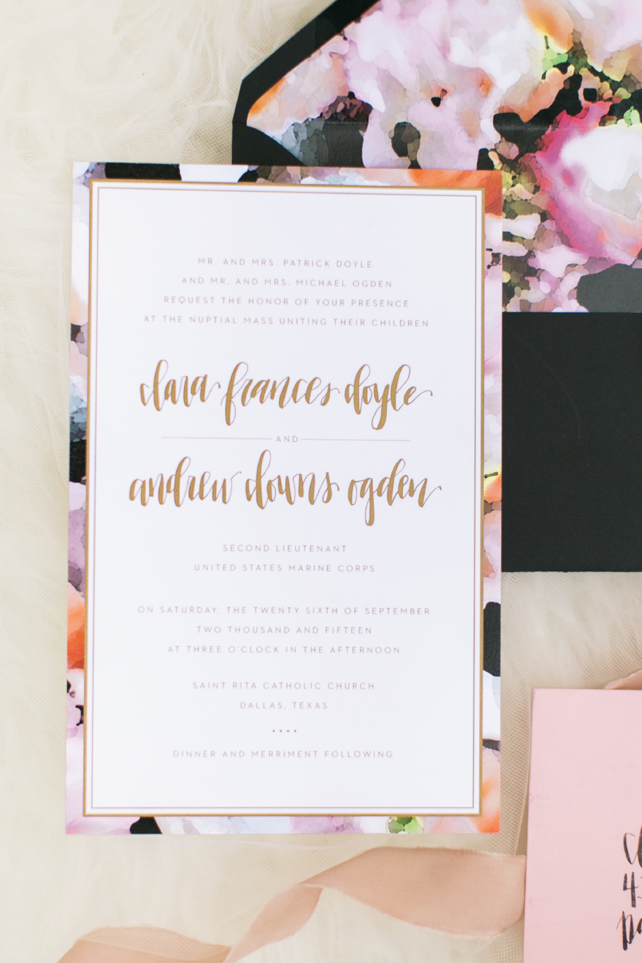 Simple gold wedding invitation with watercolor floral pattern accent as a border.