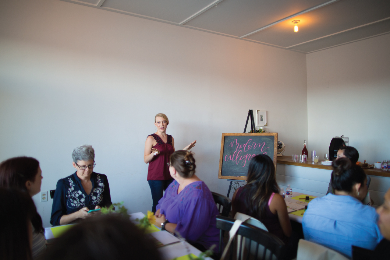Clara from Goldie Design Co. teaching modern calligraphy workshop in Corpus Christi, TX