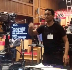 conducting The Roots/orchestra at rehearsal