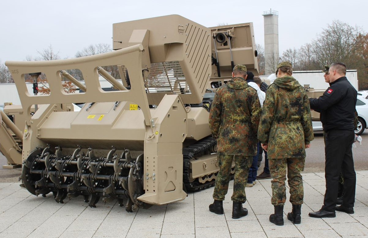 Representatives of the German Armed Forces viewing the GCS-200 in the Mine Clearance configuration with our unique tiller attachment T-200.