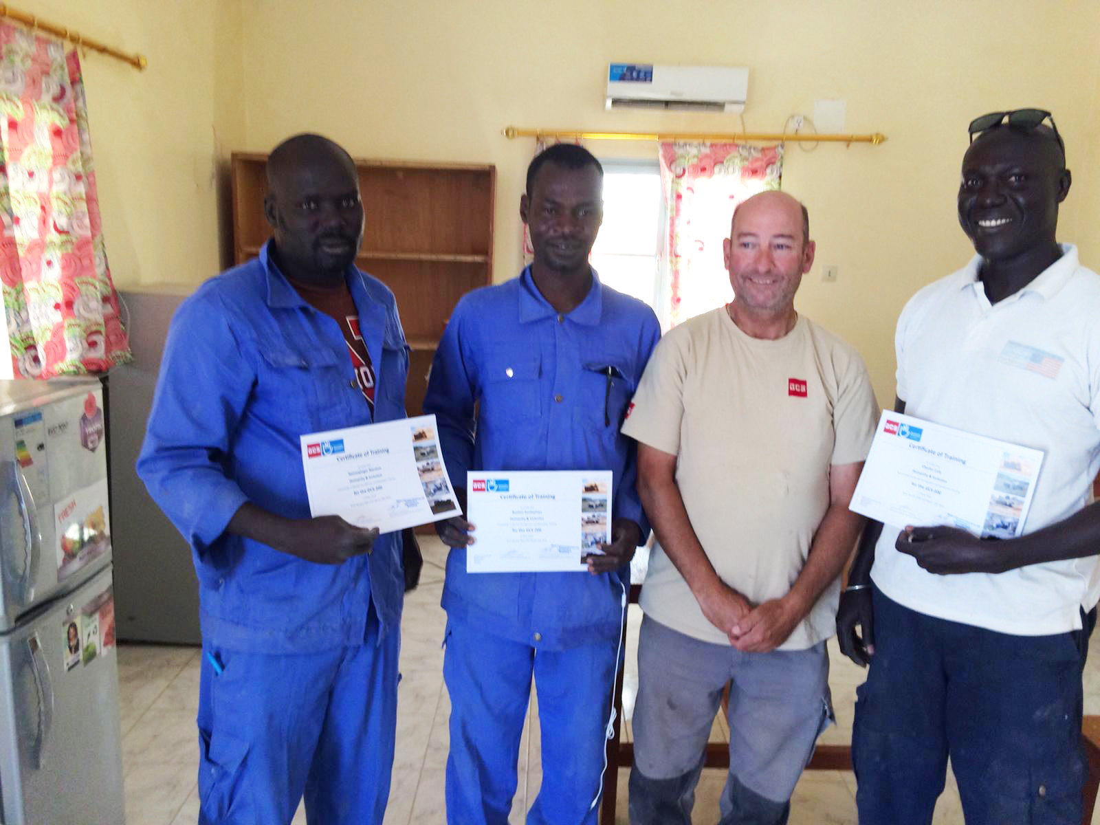  Three local HI operators are presented with their Certificates of Training by GCS’ Global Technician 