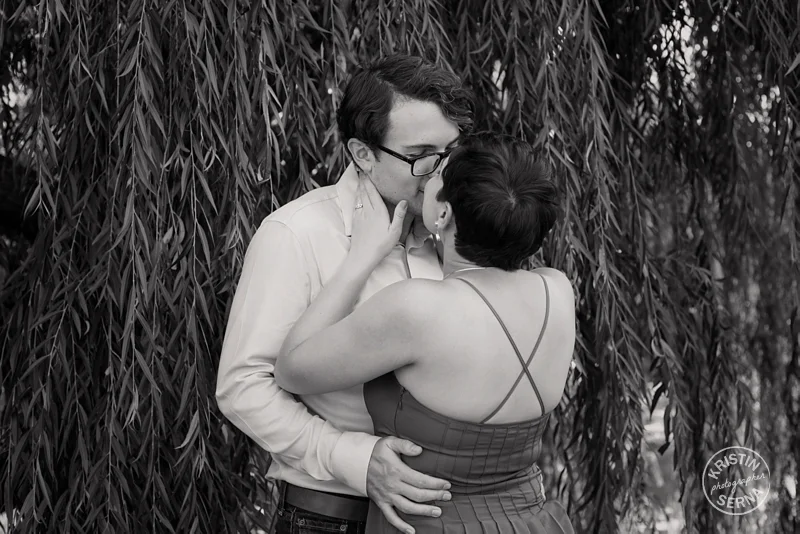 Black and White Engagement Photo in front of a weeping willow.