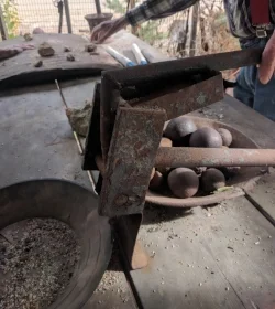 This is a miniature version of the large (ten-feet high, I think) actual crushers.