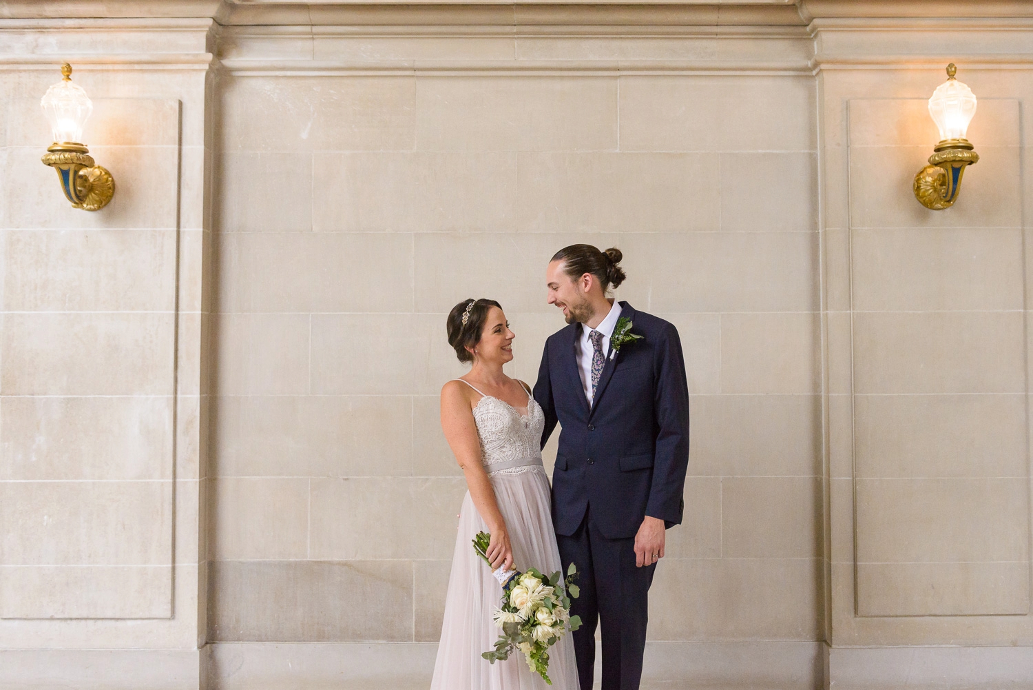 Couple smiling at San Francisco City Hall wedding