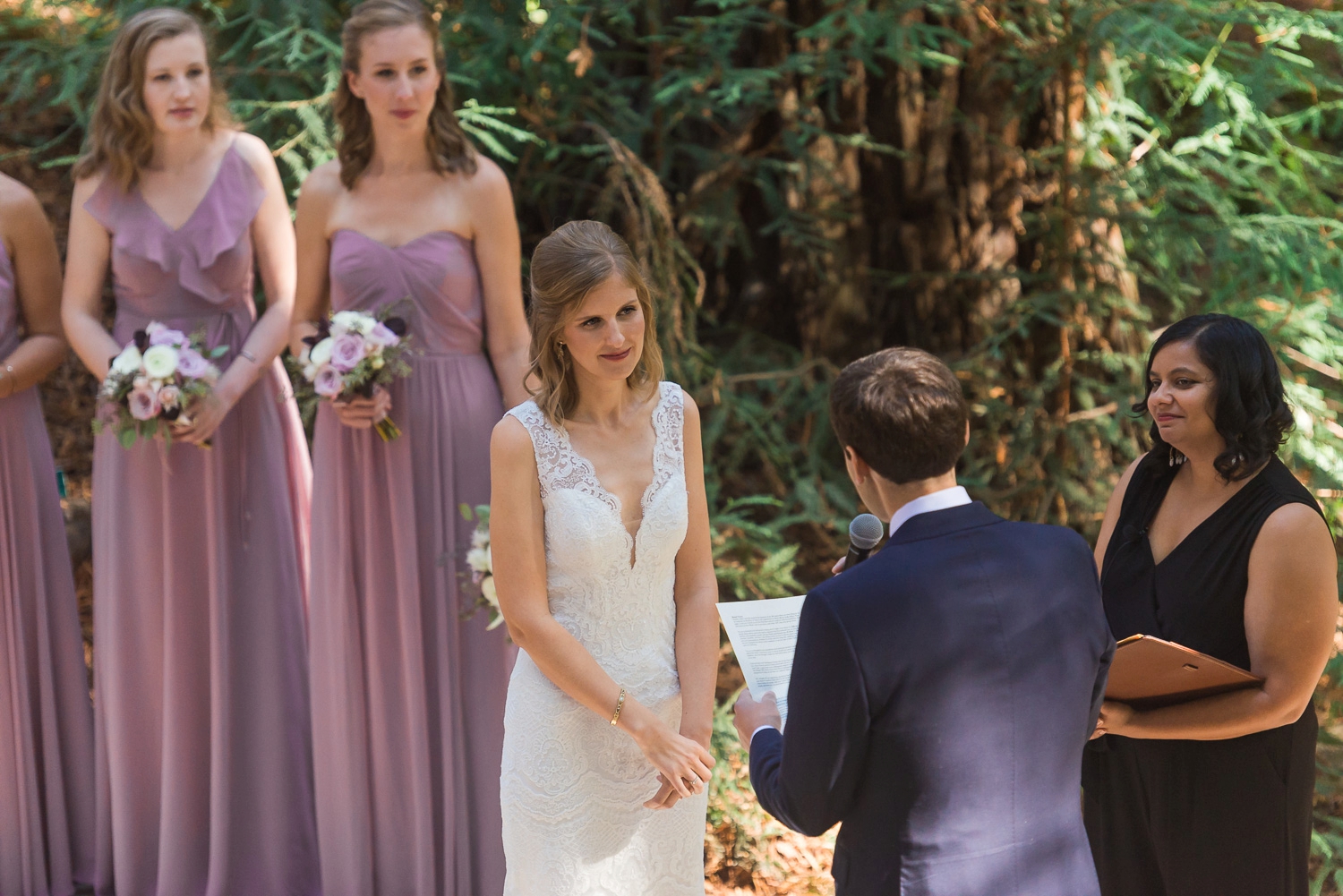 Groom saying vows to bride
