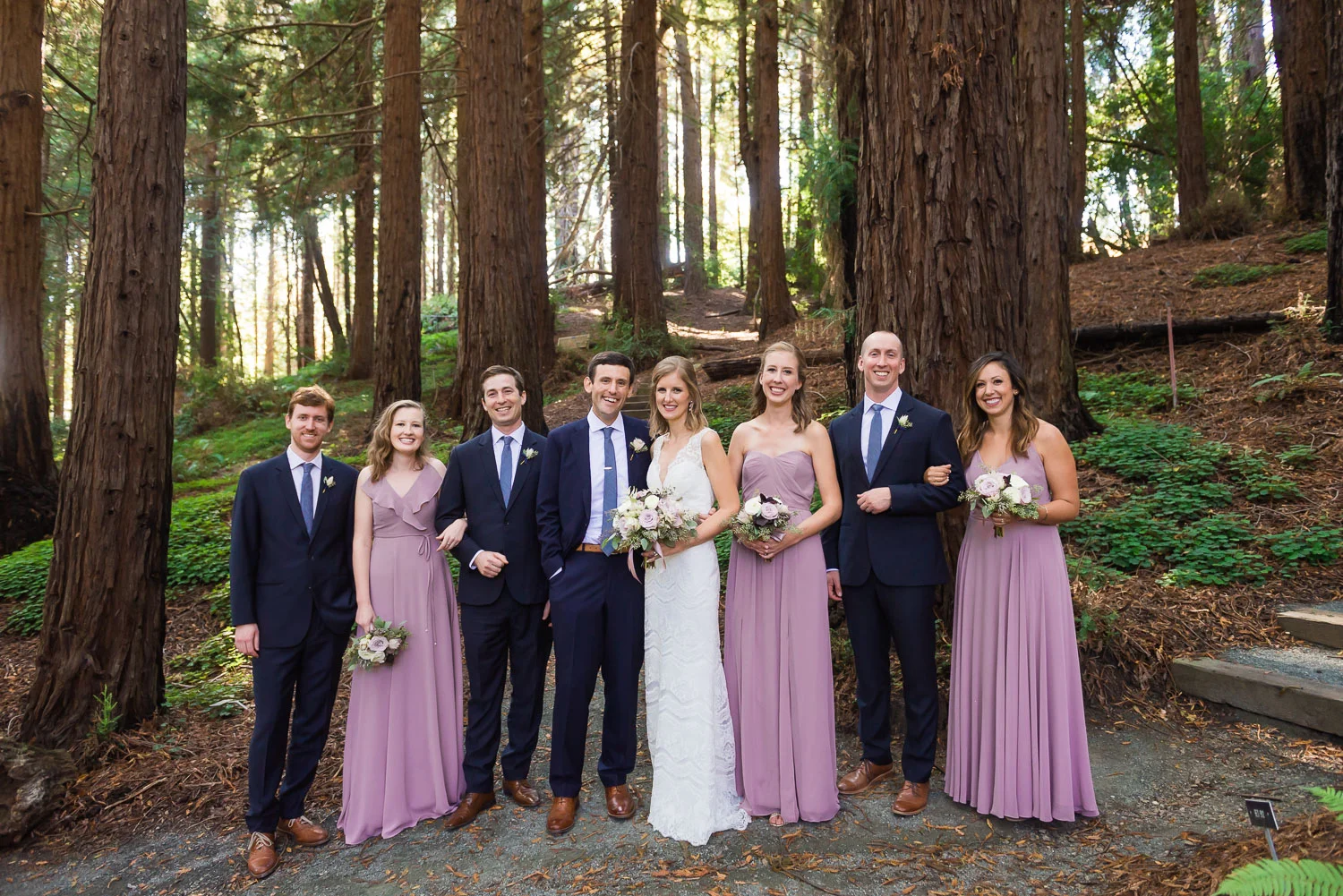 Wedding party in a redwood grove