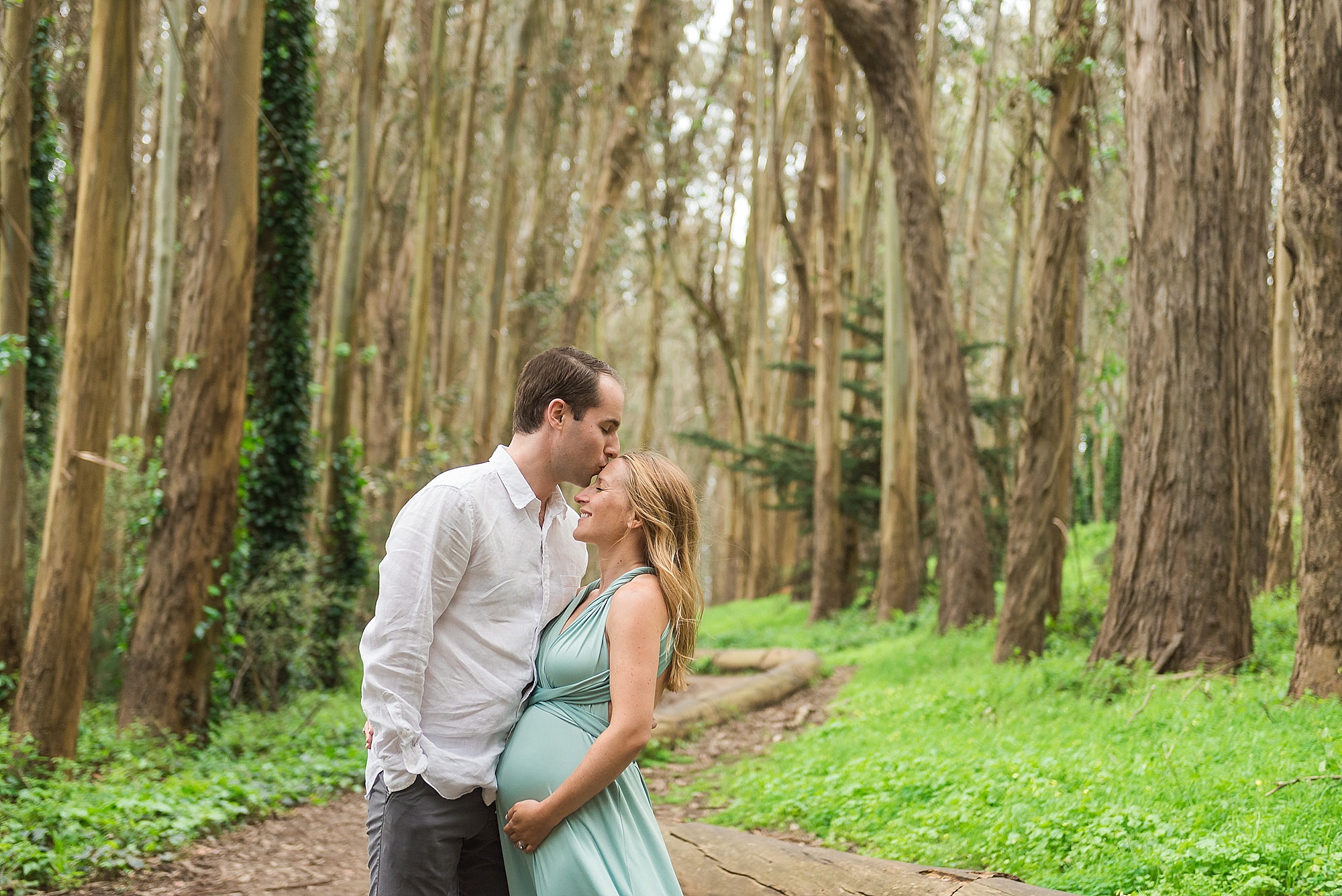 Married couple under eucalyptus trees