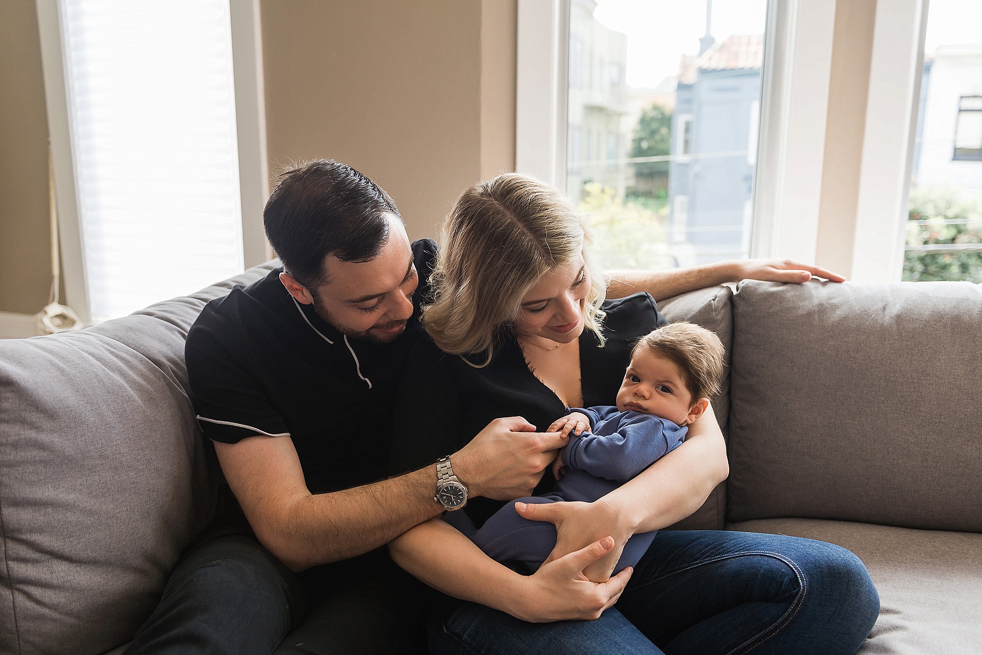Family on the couch with baby