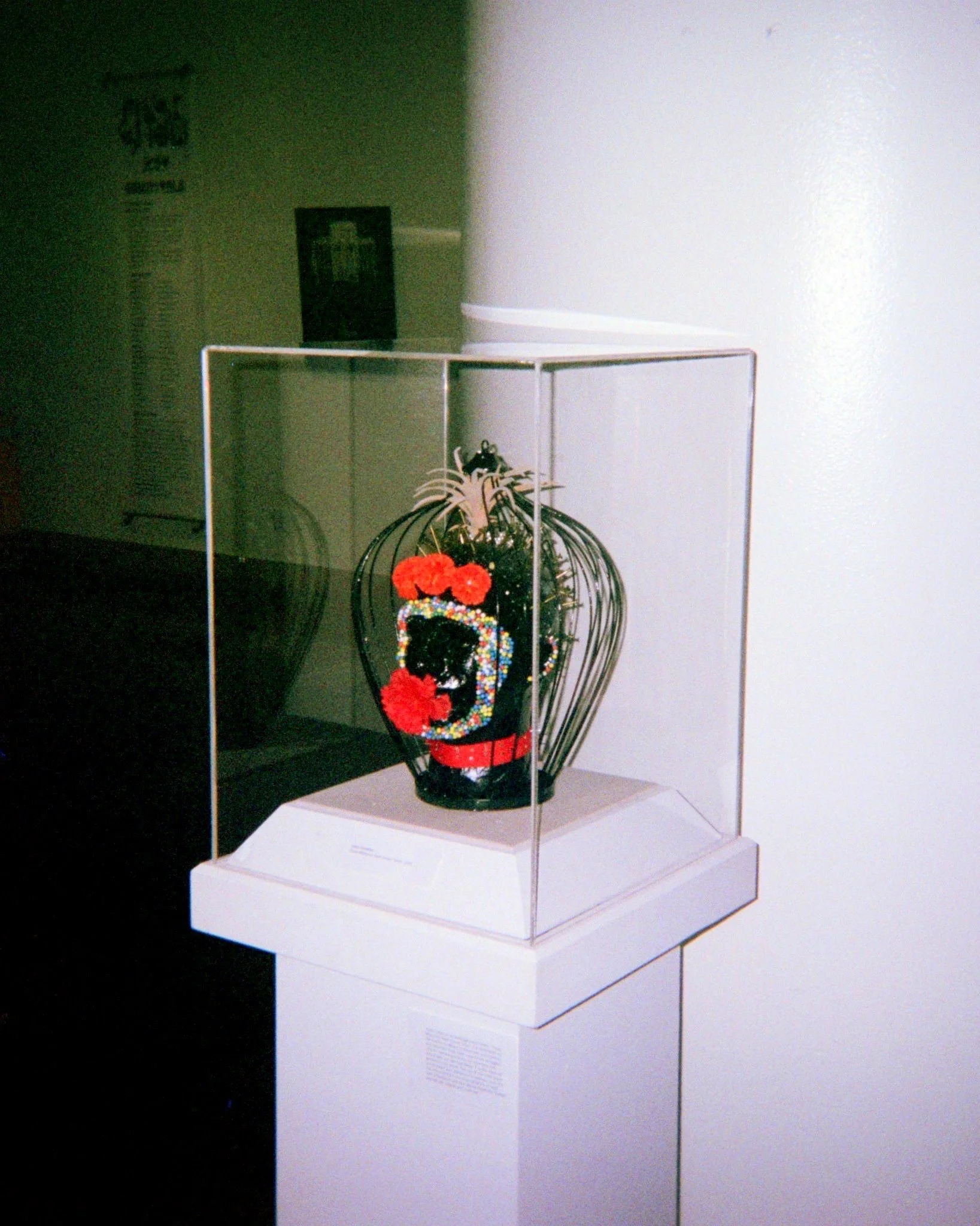  Assemblage for the group exhibition,  Essentials: Mask Show  (2020) exhibited at the San Antonio Public Library in San Antonio, Texas curated by Misa Yamamoto and Fabian Leon Villa from Essentials Creative.  Materials: papier-mâché, paint, styrofoam