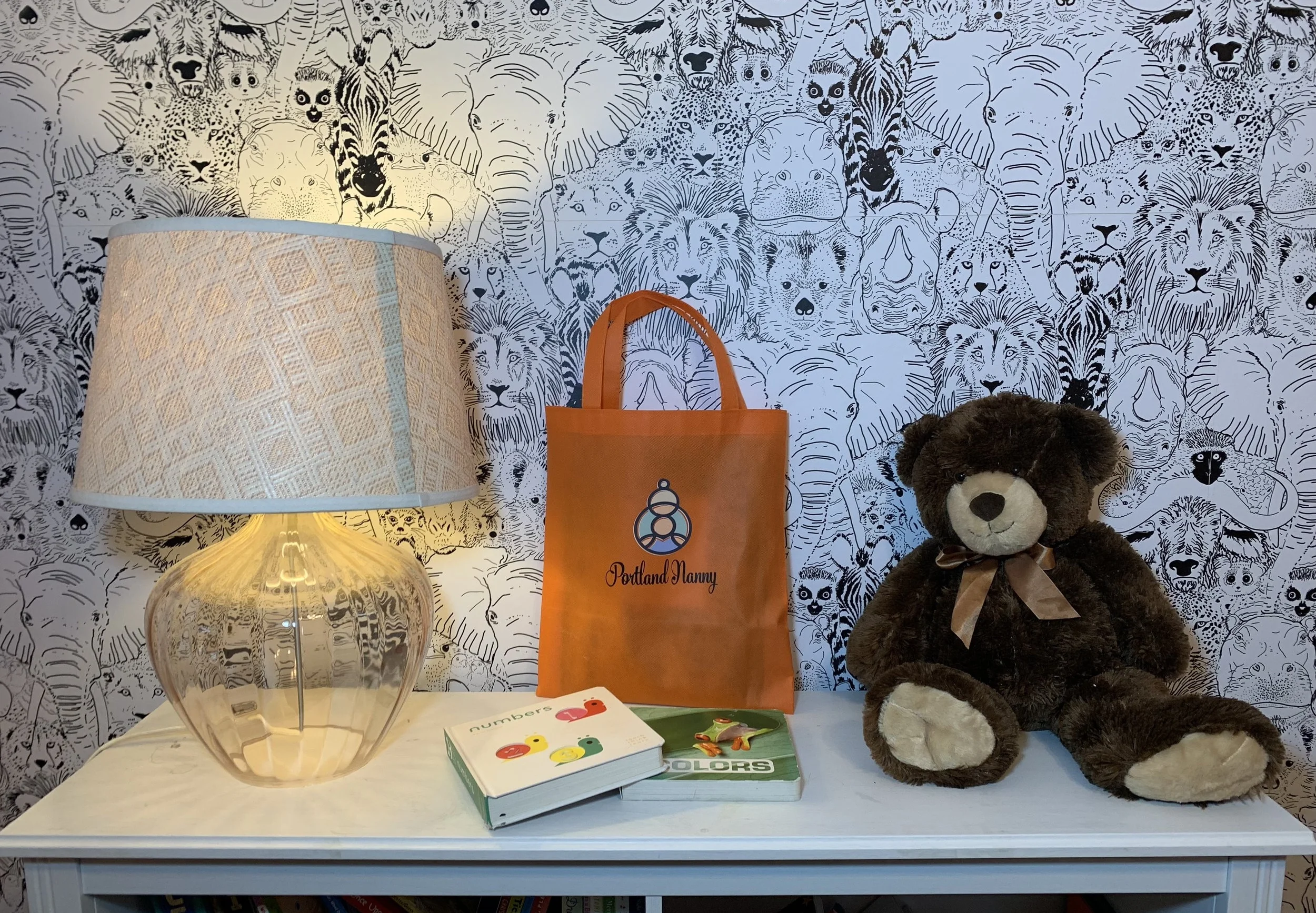 Totes come in all colors and each contains four curriculum packets separated out by age; infant, toddler, preschool & elementary.