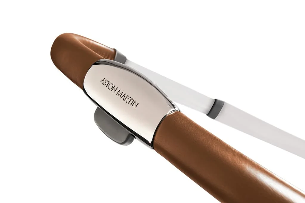 surf_aston_martin_edition_details_-_engraved_chrome_boss_and_tan_leather_handle.jpg