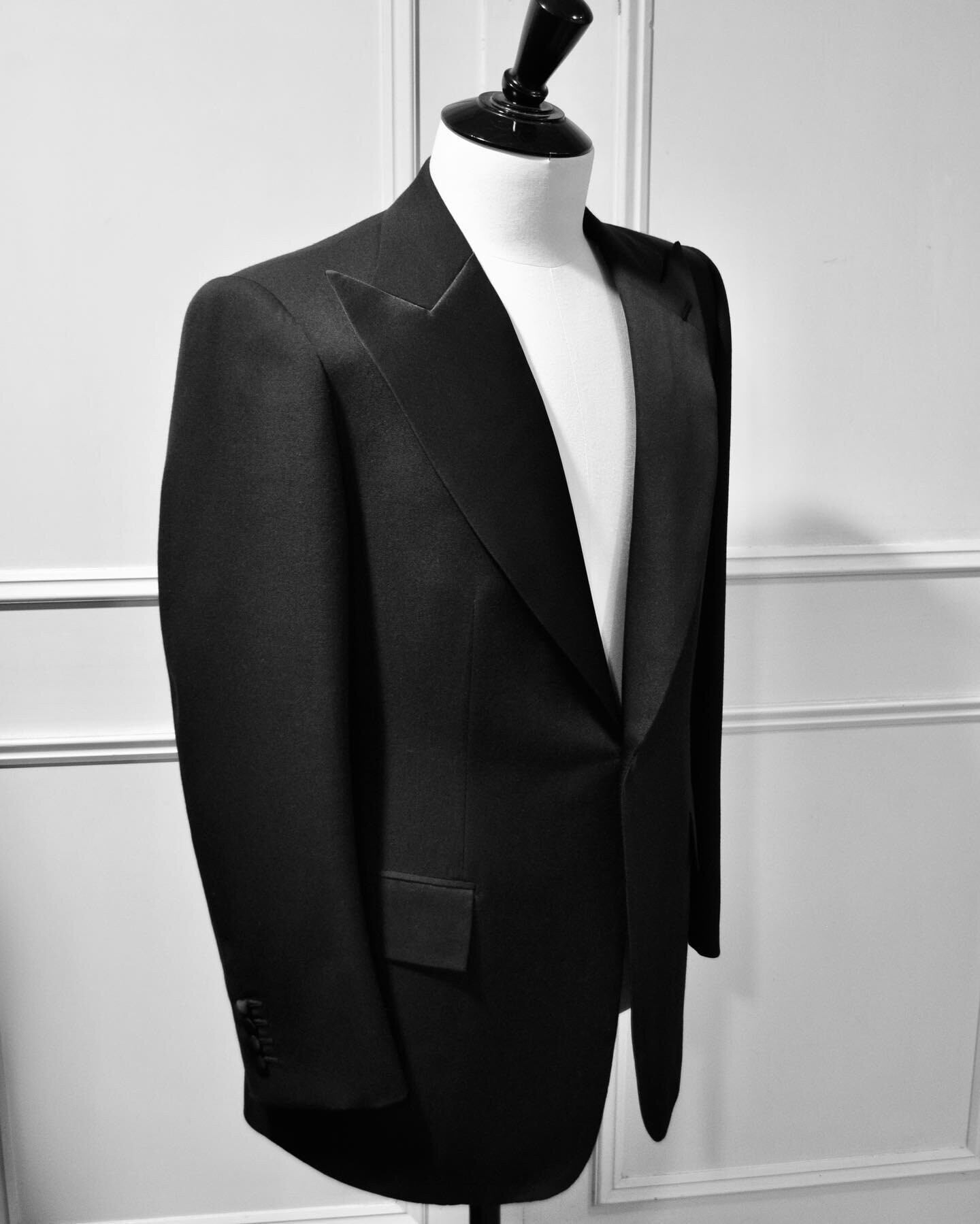 A classic single breasted dinner jacket, in a fine barathea with pure silk satin facings