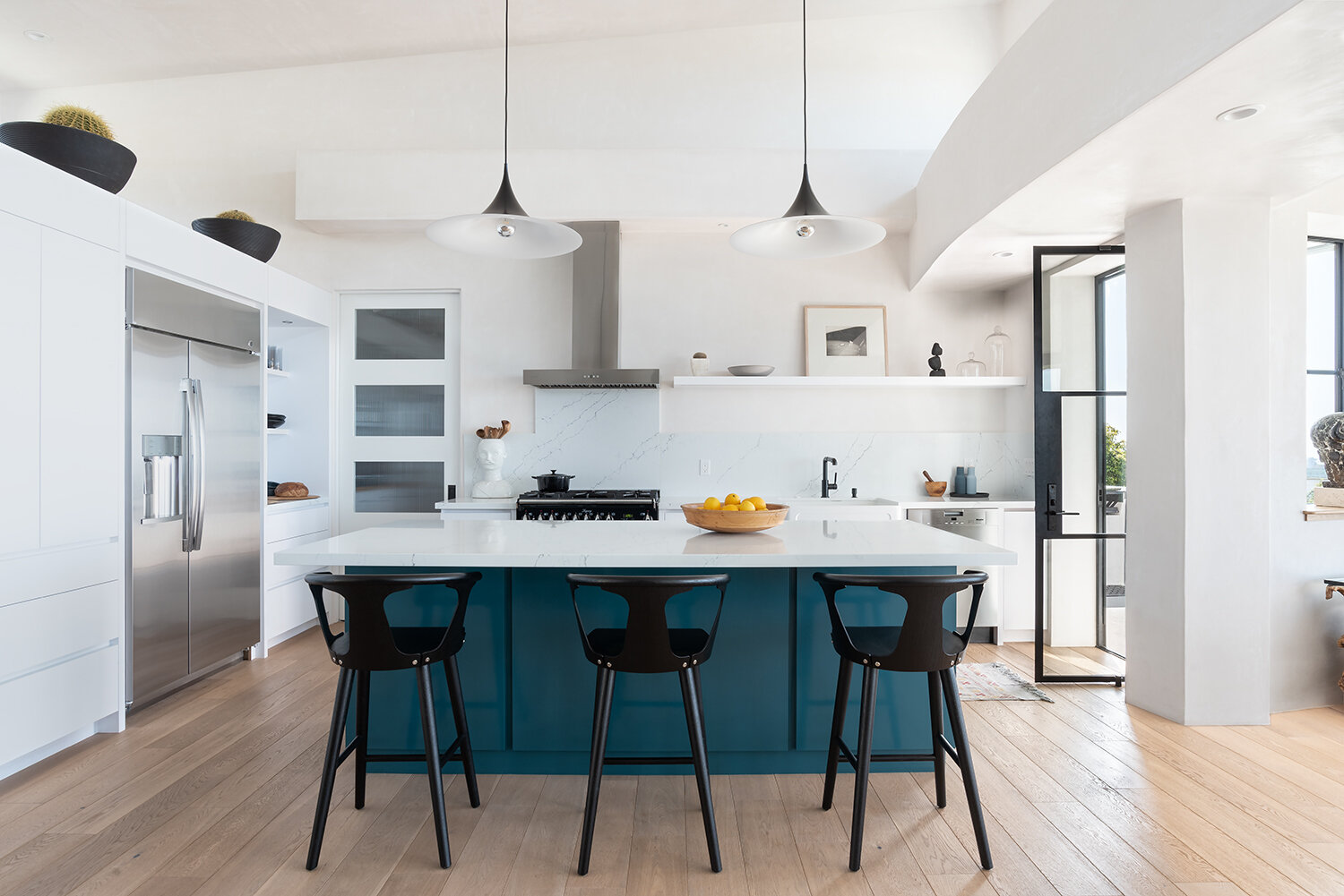  Carpinteria, California modern kitchen. Interior design by Mint Home Decor. Photography by Crystal Waye Photo Design. 