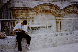 Team member Phil Supple with camera in Old City Jerusalem, summer 1990