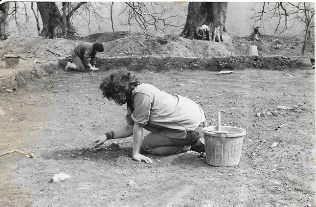 Me, trowelling, looking for Iron Age postholes - Easter 1981 at Castell Henllys, Pembs