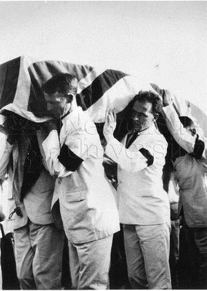 g-bell-funeral-flag-draped.jpg
