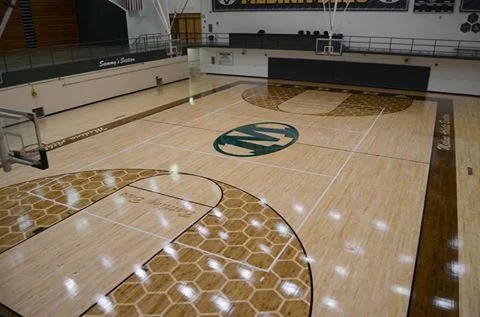 Re-conditioned Medina High School Richard H. Clevidence Gym Floor