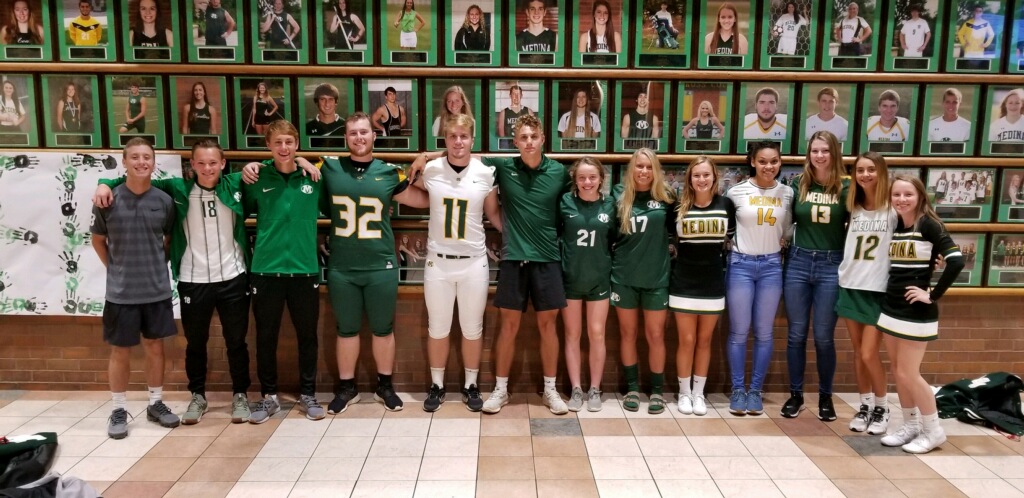 Members of each of the Medina High School teams sporting new uniforms in the 2018-2019 school year.