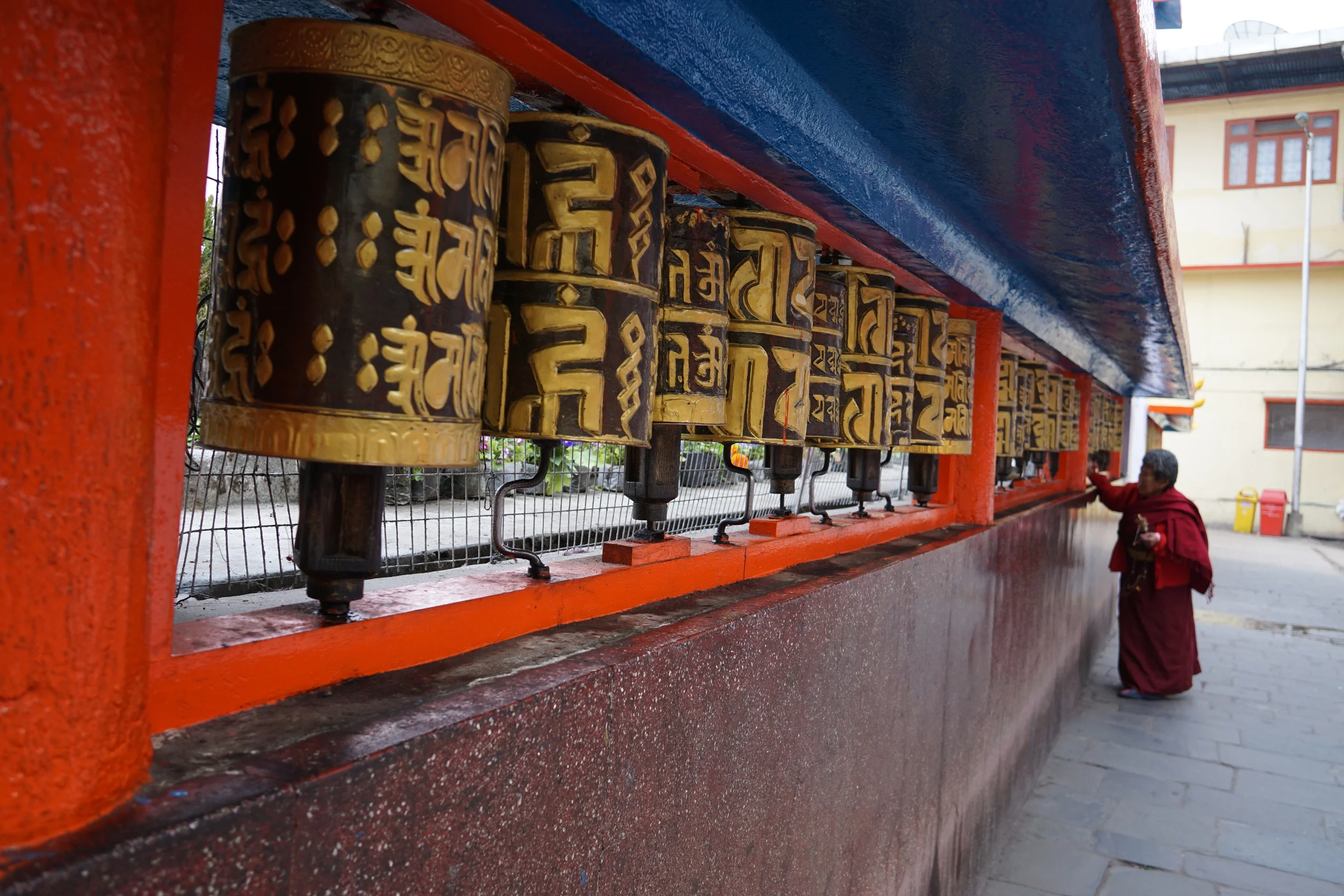 Lamas at the Ranka Monastery turning the famous prayer wheel and in turn, I stared along hoping she would pray for me too.