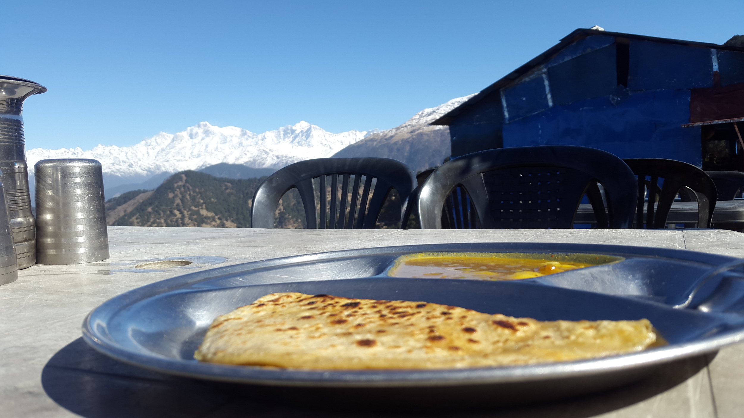The parathas and hot steaming daal with the perfect view of the Himalayas. You can't replicate the same experience anywhere in the world except here when trekking in the indian himalayas.