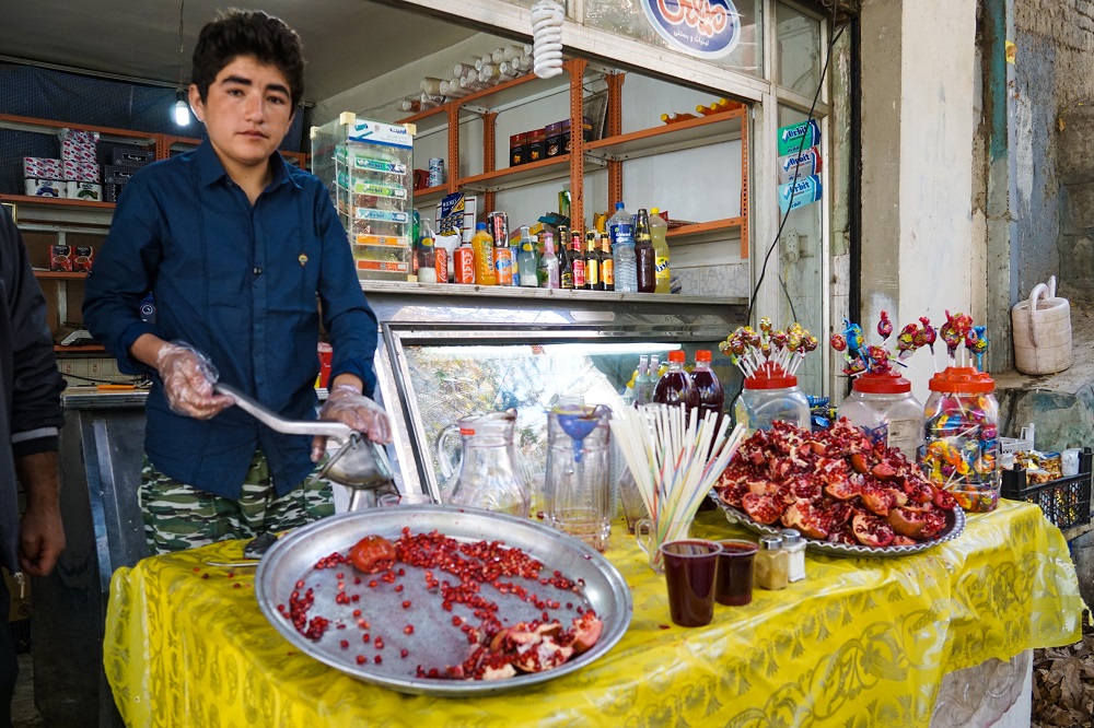 a stop to have some pomegranate juice in the park.