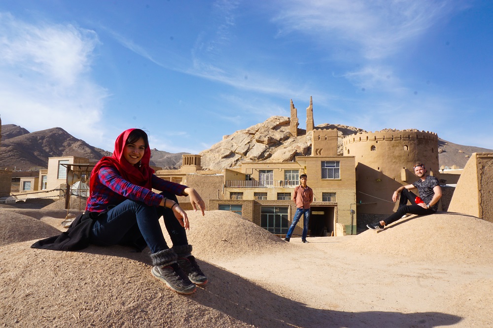 more ruins amidst dome-shaped buildings.
