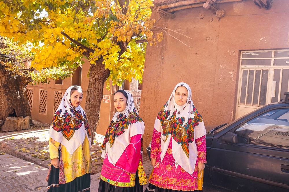 floral prints and pleated skirts, unique dresscode of abyaneh.