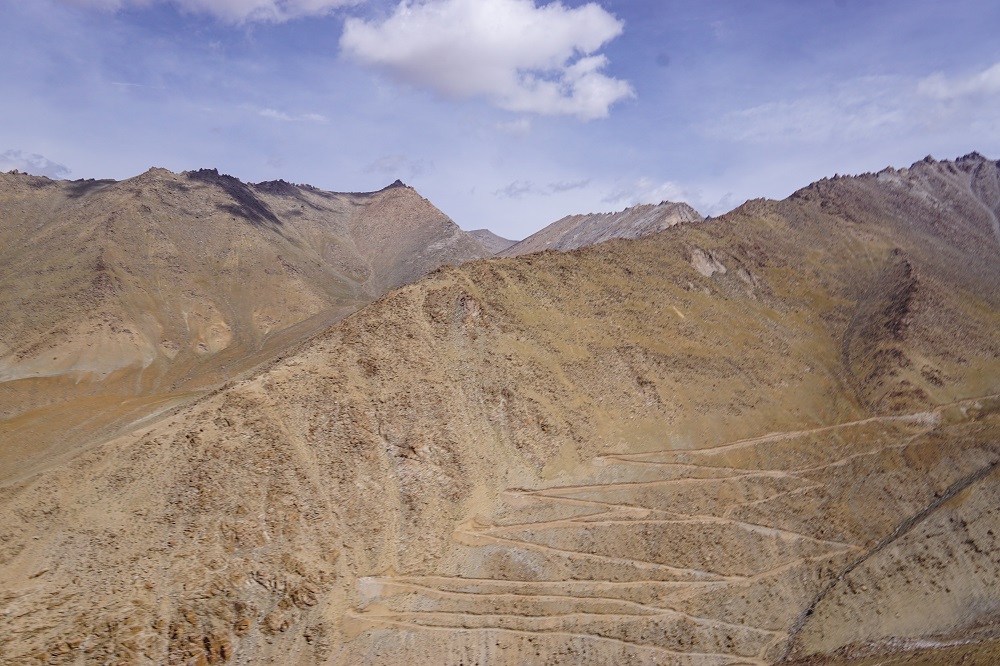 A treacherous climb carved through the mountains in Ladakh - just a glimpse of what it is like to ride here.