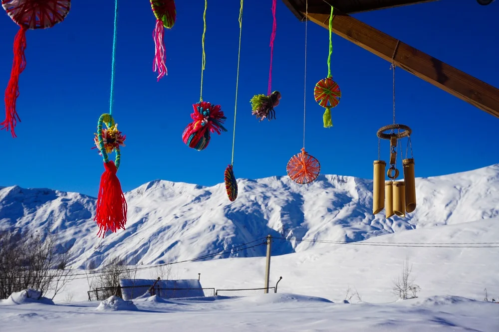 At the front door of our happy yeti hostel, the best place to learn skiing or snowboarding