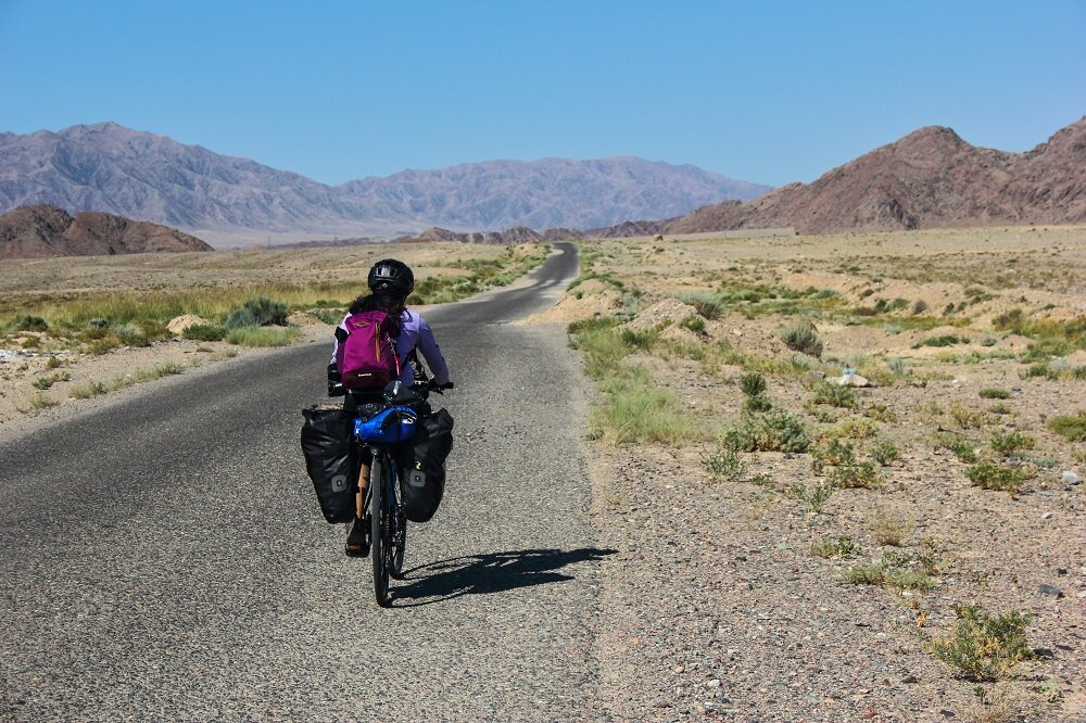 Bicycle touring and carrying all that I need for my journey in Kyrgyzstan for supposedly 45 days.
