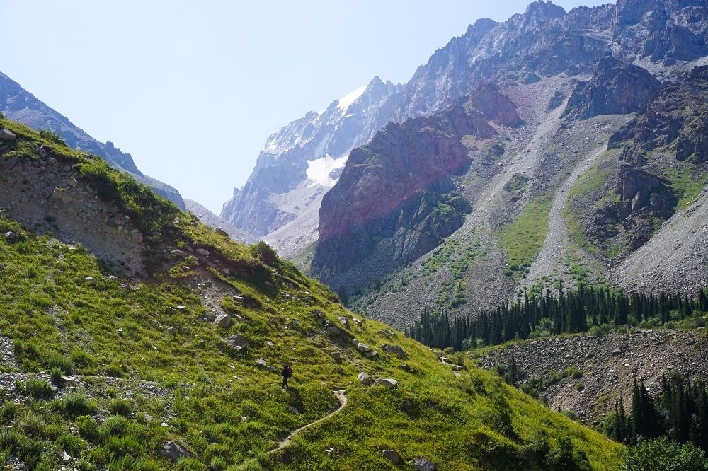The howling winds and the snowy summit twinkling in the sunlight gave me new ideas on whether this day trip should be extended to 3 day trip in Ala Archa National Park.